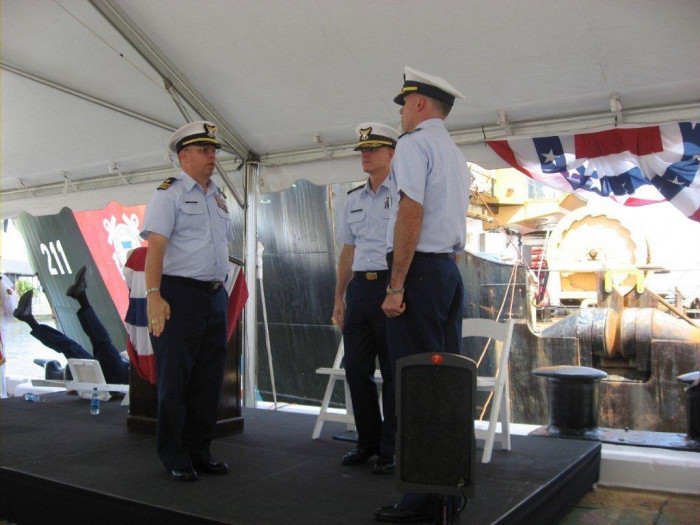 36. My father’s chair failing at a Coast Guard change of command.