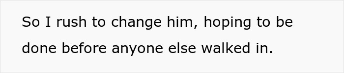 The dad hurriedly changed the baby's diaper.