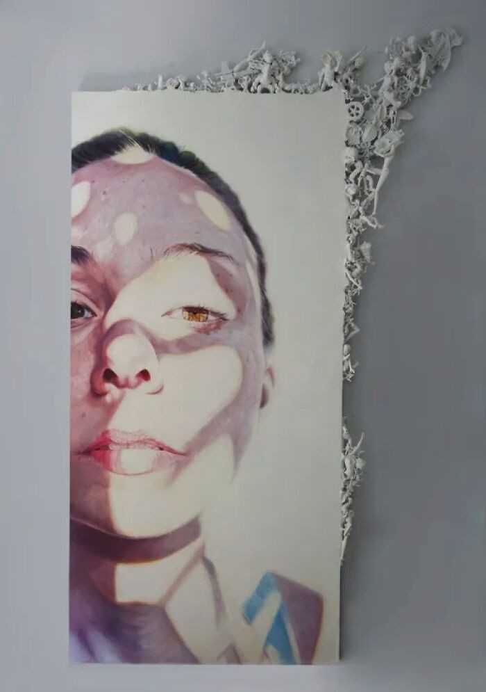 "Oil on linen with applied found objects."