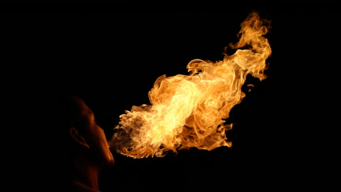 Parent and child reviewing safety guidance on social media challenges and hazards.