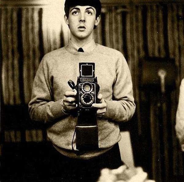 27. Paul McCartney takes a mirror selfie (1959).