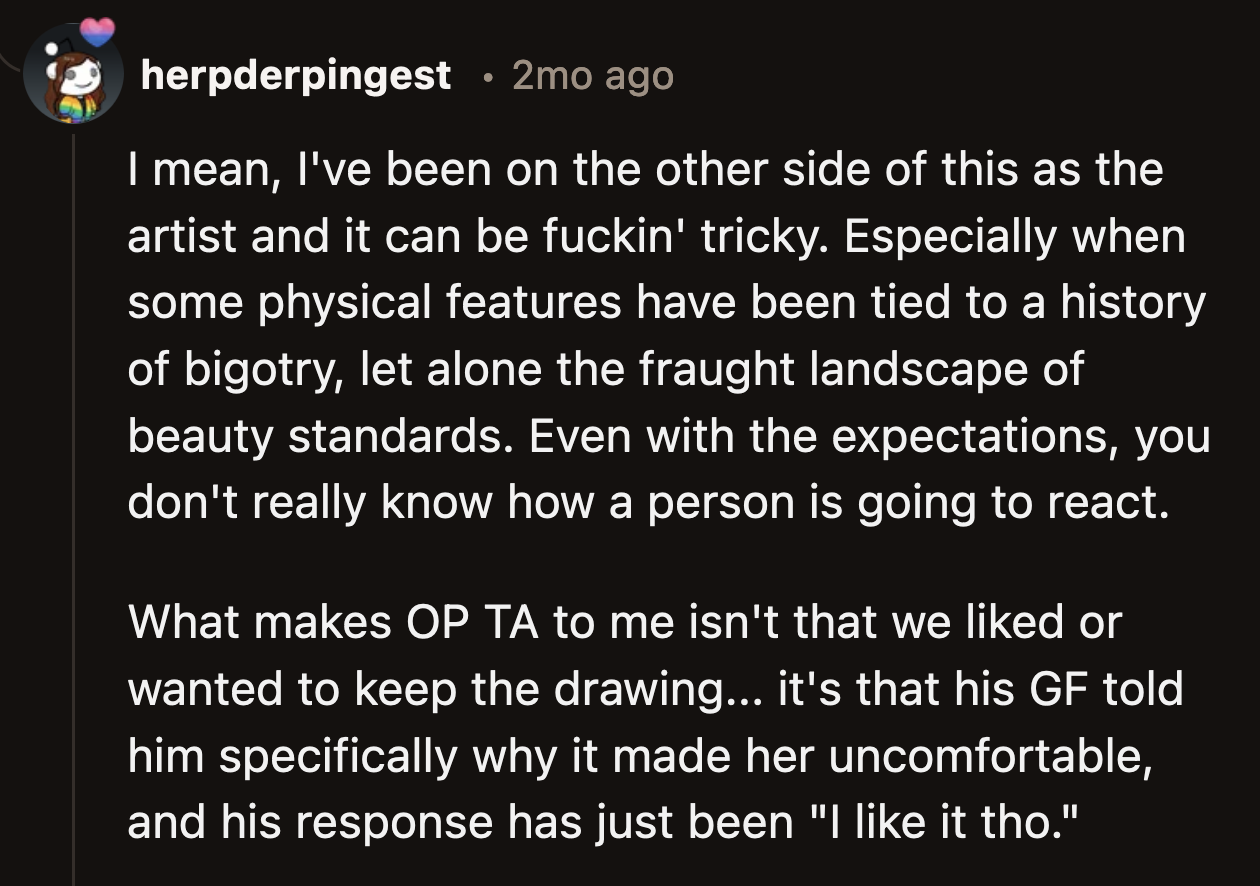 Still, OP shouldn't have prominently displayed the photo at work after his girlfriend shared how she felt about it.