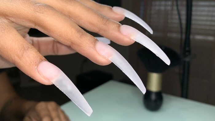 5. Long a*s fake nails.