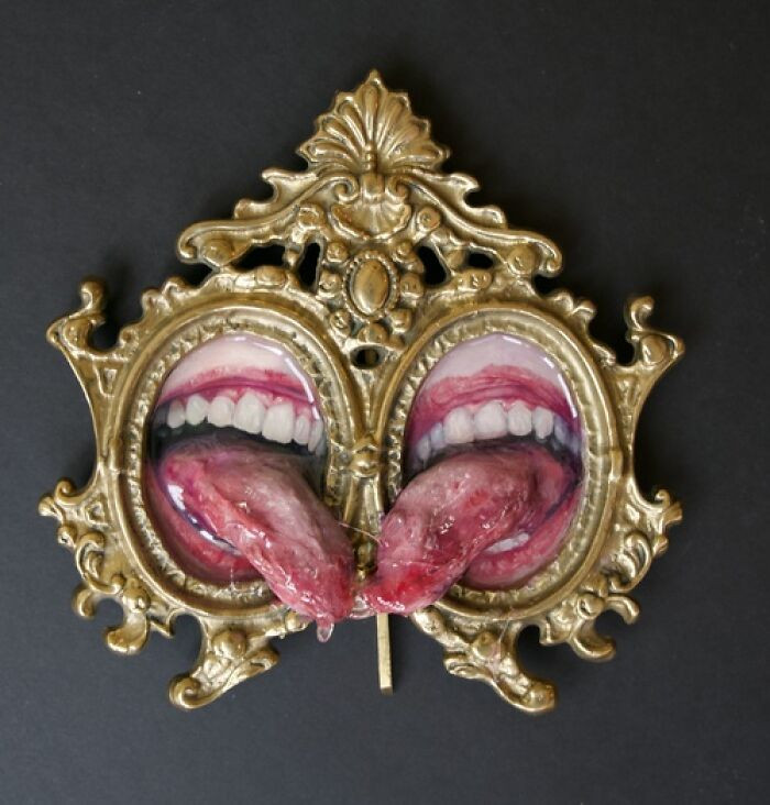 "Oil on panel, clay, modeling paste, and resin in vintage frame."
