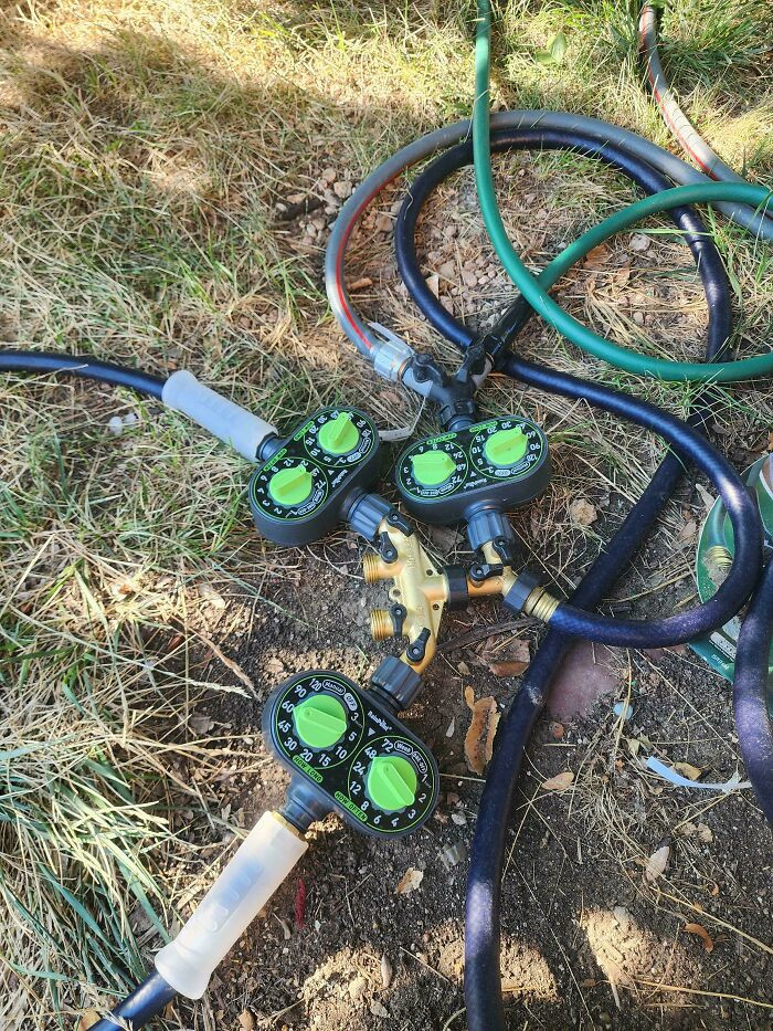 "Poor Man's Sprinkler System While I Go Out Of Town"