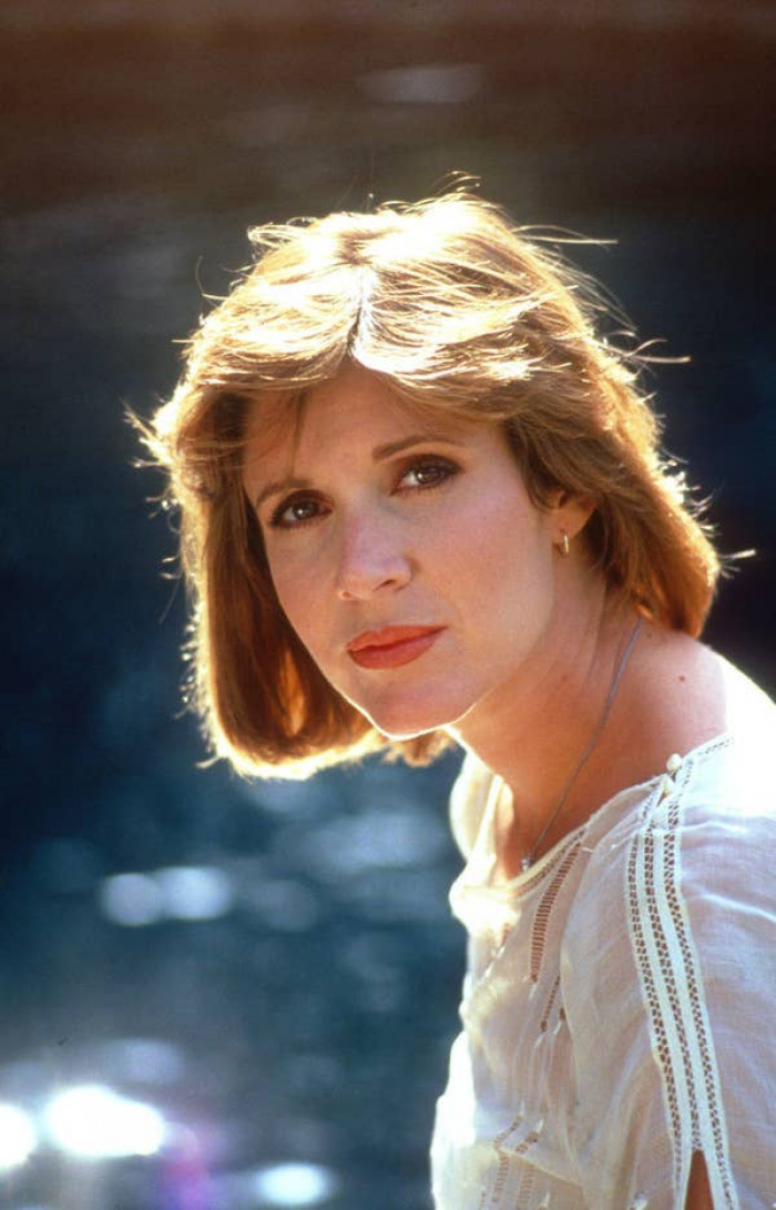 14. Carrie Fisher as Miss Scarlet in Clue (1985)