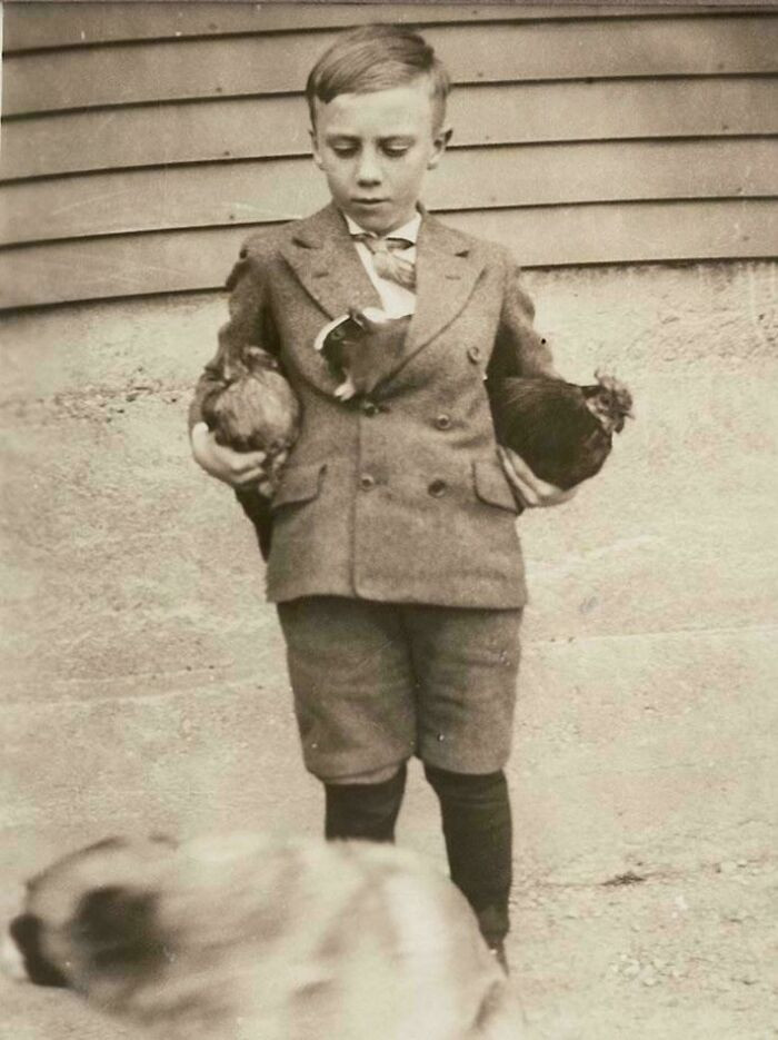 "My 8-Year-Old Dad With His Four Pets. 1932"