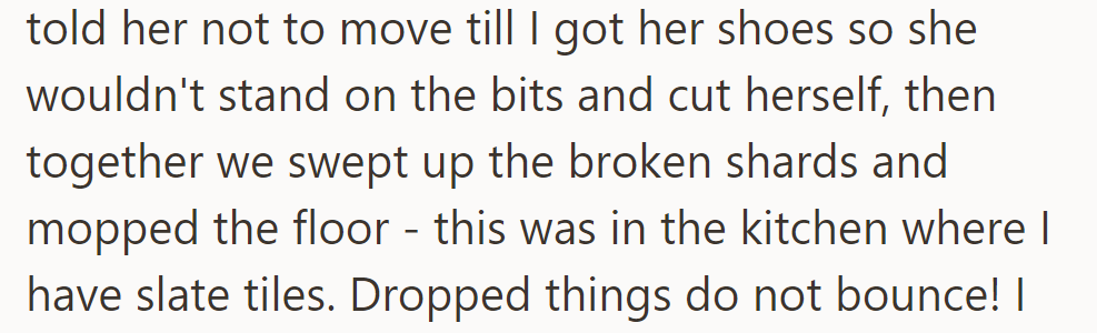 OP told her to wait, get her shoes, and clean the broken mug on the slate floor. Lesson: things don't bounce!