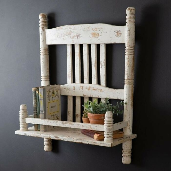 A shelf made from the back of a chair