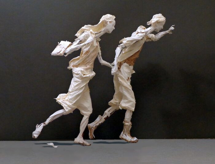 Ariel Eddy And Grace, The Scavengers sculpture, two intertwined folded paper figures