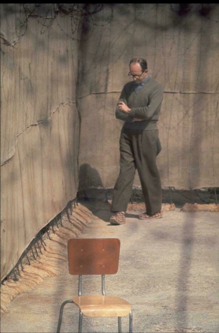 Adolf Eichmann walks through the prison yard at Ramla Prison in Israel, 1961.