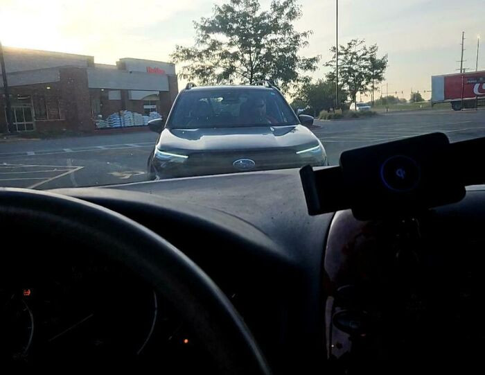 'This Guy Sitting In Front Of My Car With A Camera On The Steering Wheel, Just Staring At Me'