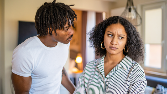 Couple having a calm conversation, focusing on honesty and asking questions about infidelity