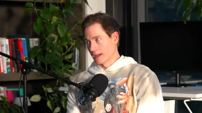 Biohacker Johnson reviewing high-tech wellness data from hormonal and chemical analysis