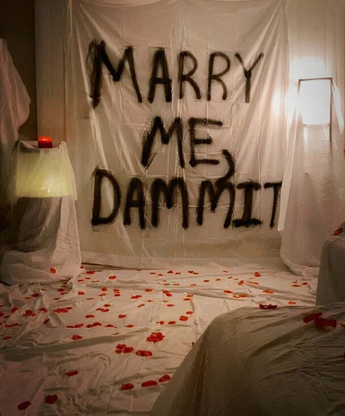 "My Attempt At A Romantic Proposal Banner Turned Into A Scary Rock Cover Art"