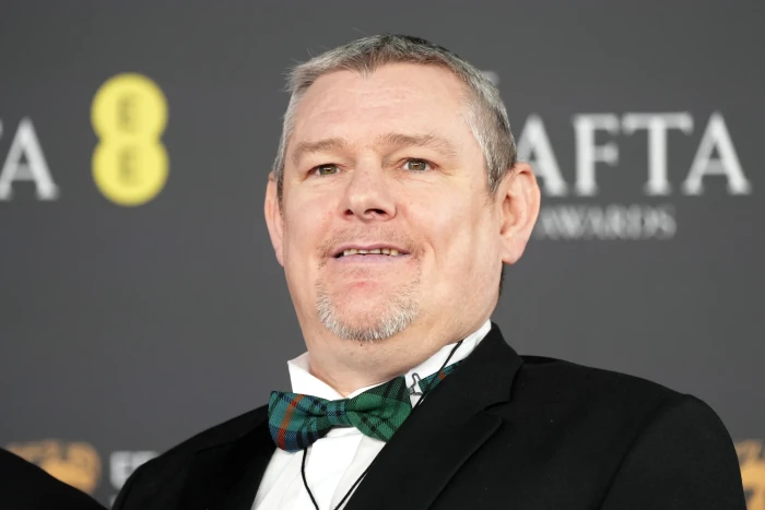 Tourette’s advocate in an auditorium during BAFTAs controversy amid social debate