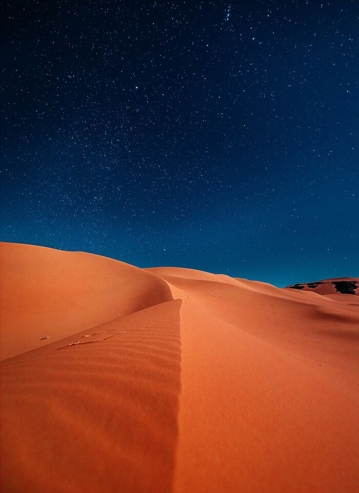 50. The Algerian Sahara at night is an absolute marvel. Thanks to the absence of light pollution, the sky is a breathtaking sight to behold.