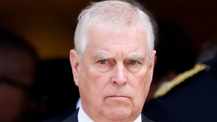 Police vehicles near Royal Lodge after search concludes, Andrew scrutiny continues.