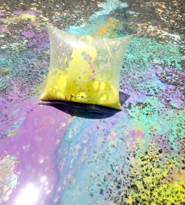 5. Exploding paint bags can be a messy, fun art project for your children