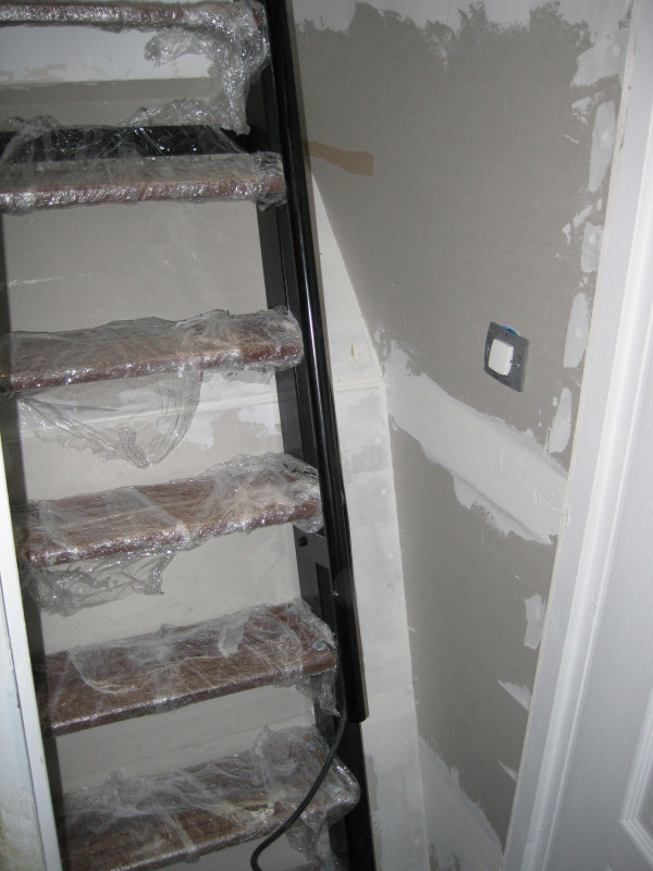 He encased the stairs within a compact capsule.