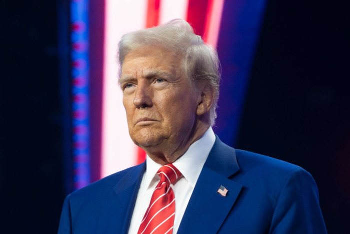 News-style banner about Trump mobilizing federal law enforcement to locate Nancy Guthrie