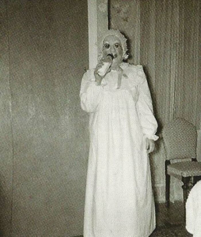 Creepy vintage Halloween costume vibes that feel straight out of another era, equal parts unsettling and unforgettable.
