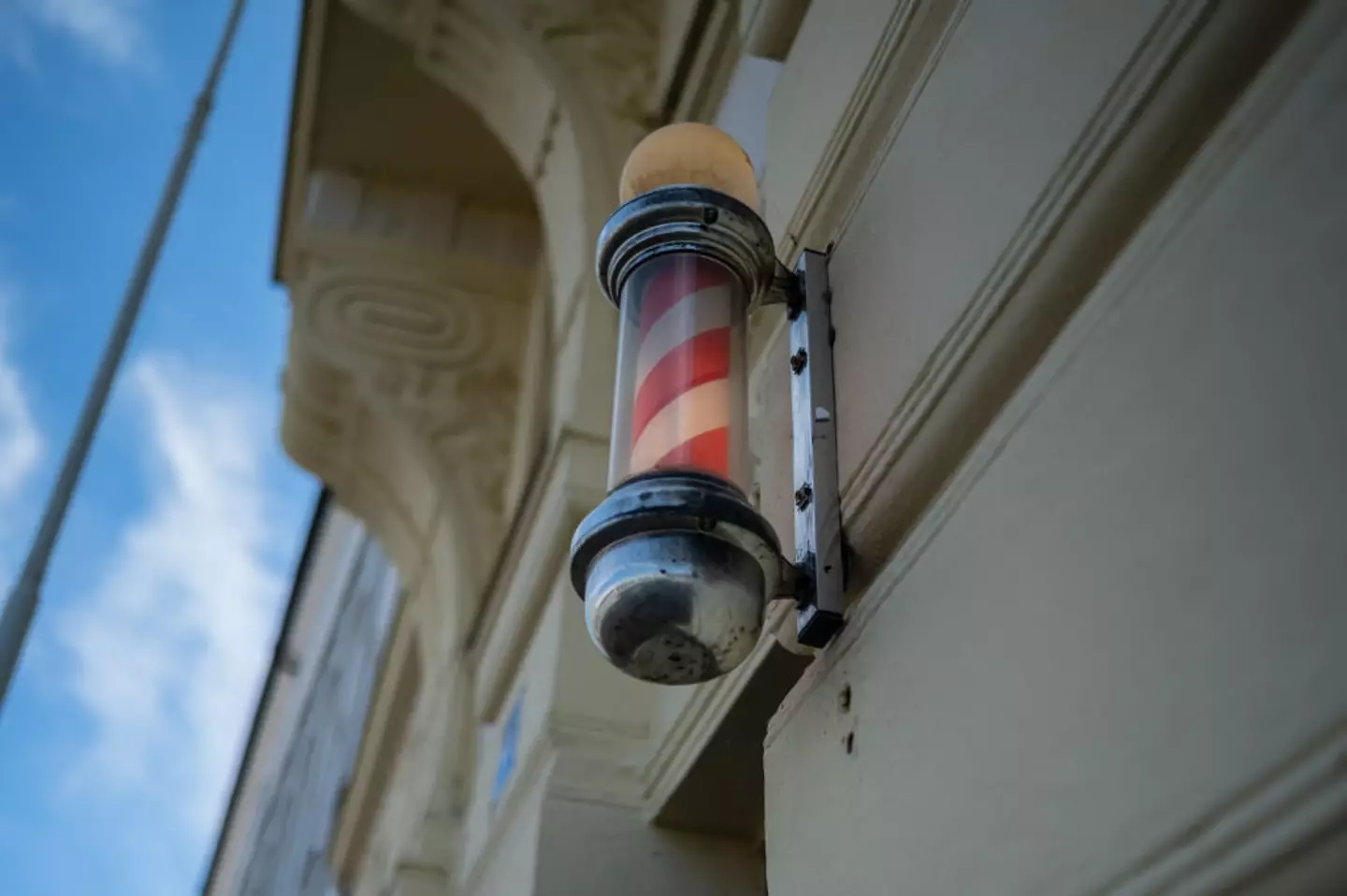 In Europe, barber poles twirl in simple red and white. Across the pond in the U.S., however, they added a patriotic twist—red, white, and blue