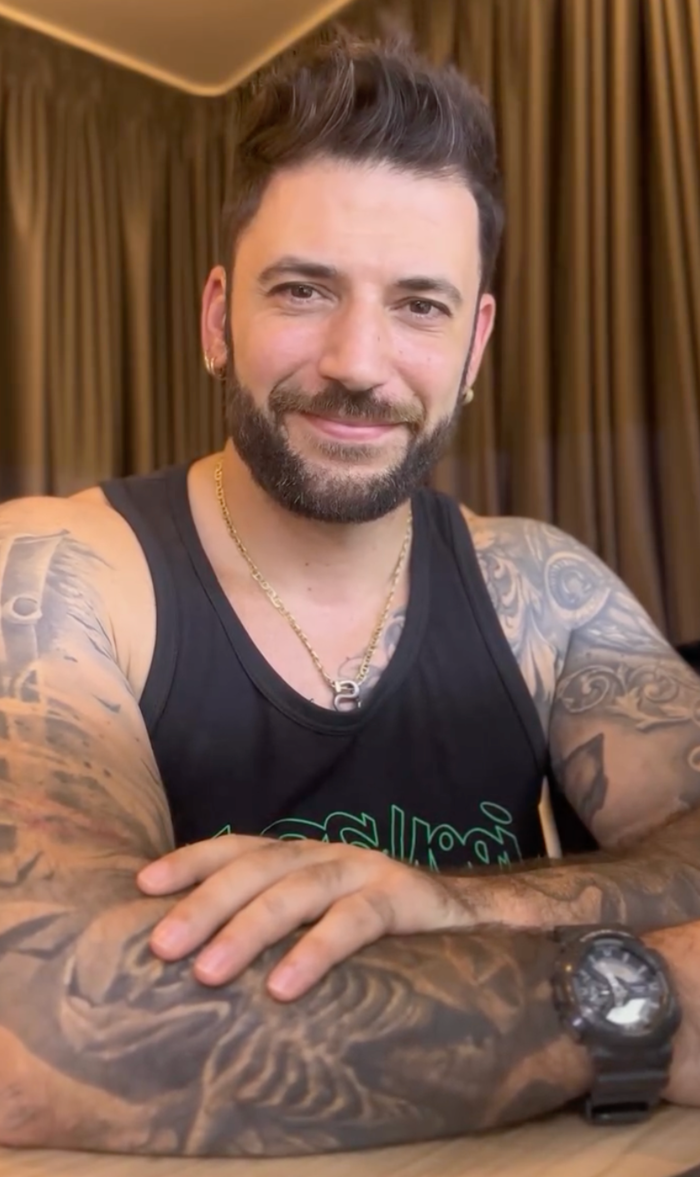 Stanislav Yanevski posing online, promoting digital safety and scam awareness