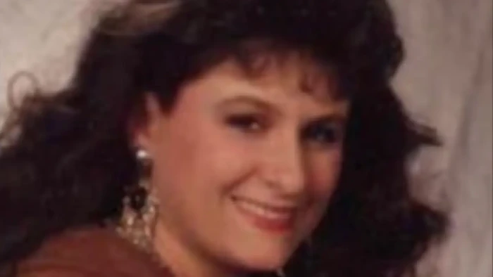 Newspaper headline collage about Michele Hundley, Smith’s return, and daughter Amanda