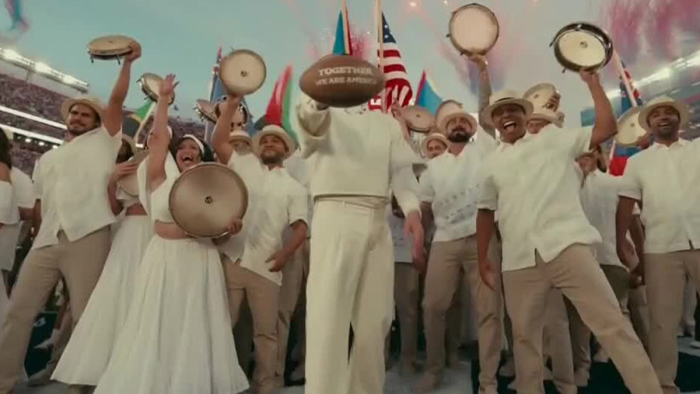 Crowd reacts to Bad Bunny’s halftime show, Trump criticism sparks celebration.