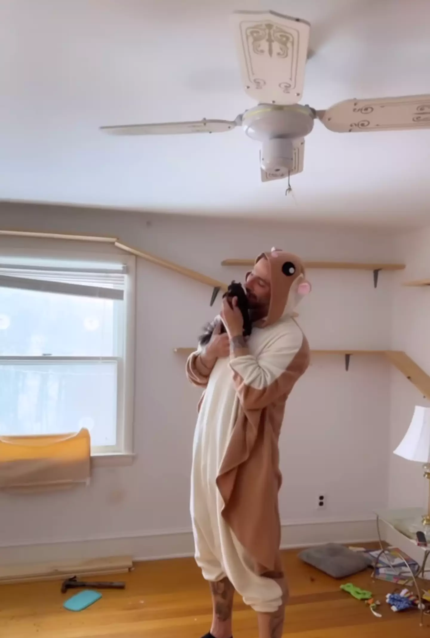 Best Friends Forever: Mark Longo and Peanut share a heartwarming moment in matching onesies