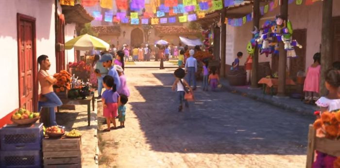 17. In Coco (2017), A Collection Of Piñatas Of Other Pixar Characters Can Be Seen Hanging From A Building