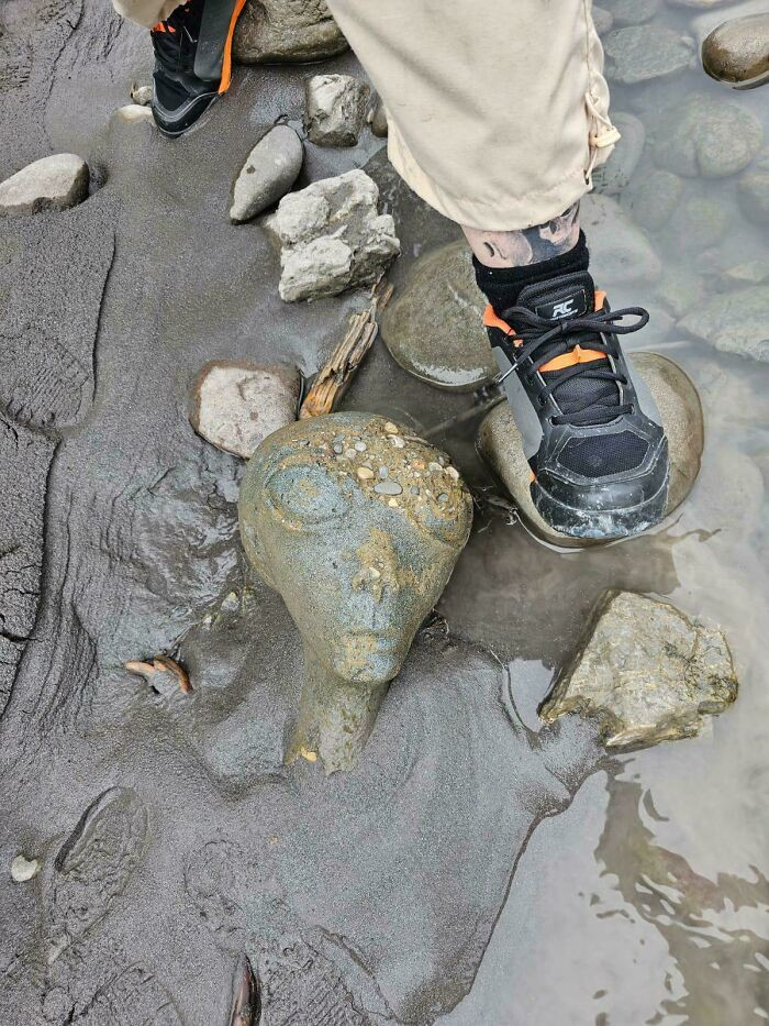 "Found An Alien Statue Head In A Riverbed"