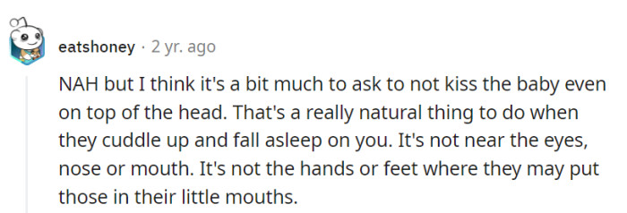 A compromise like kissing the baby's head, away from sensitive areas, might strike a balance between affection and safety.