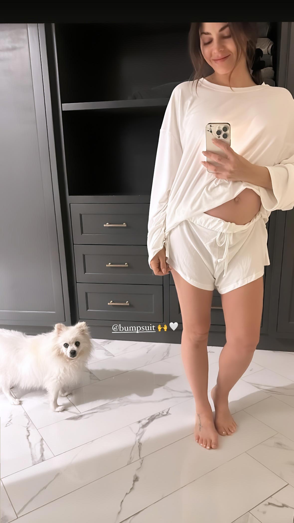 When she's not slaying in glamorous gowns, she's keeping it cozy in a white PJ set from Bumpsuit