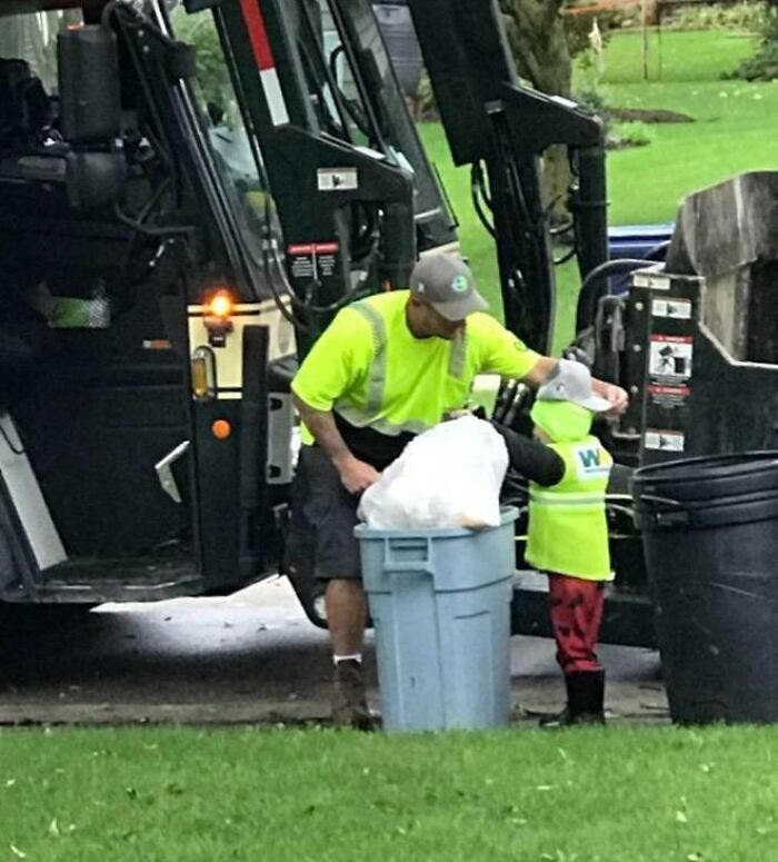6. Every Thursday Morning My Little Nephew Waits For The Garbage Man To Arrive So He Can Help. Today They Brought Him A WM Hat To Wear