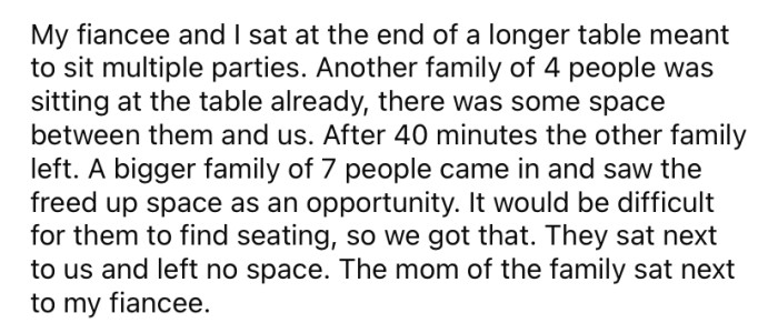 She explained that she and her fiancé went out for dinner and sat at a table when a large group of seven people came in and sat next to them.