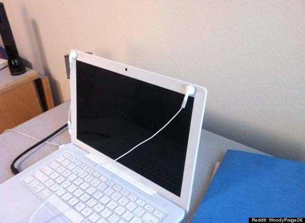 MacBook screens have built-in magnets where you can attach your earbuds.