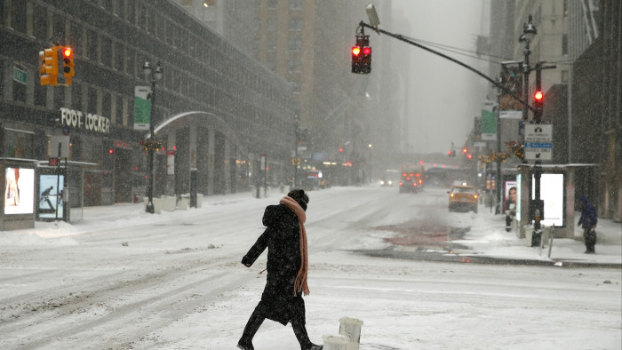 Snowbound roads with power outage aftermath across multiple US states during winter storm