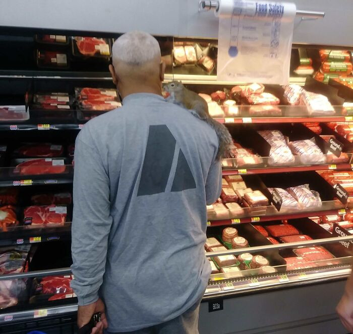 "A Guy And His Squirrel At Walmart"