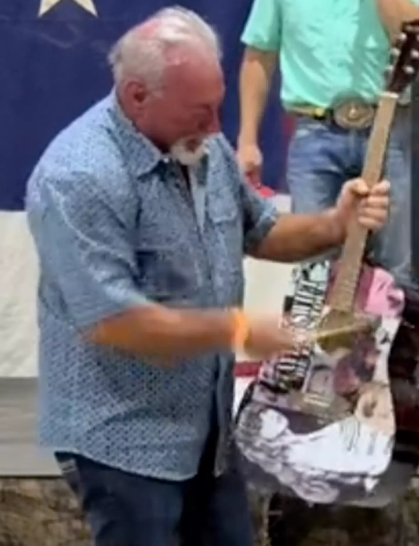 The man destroyed the guitar.
