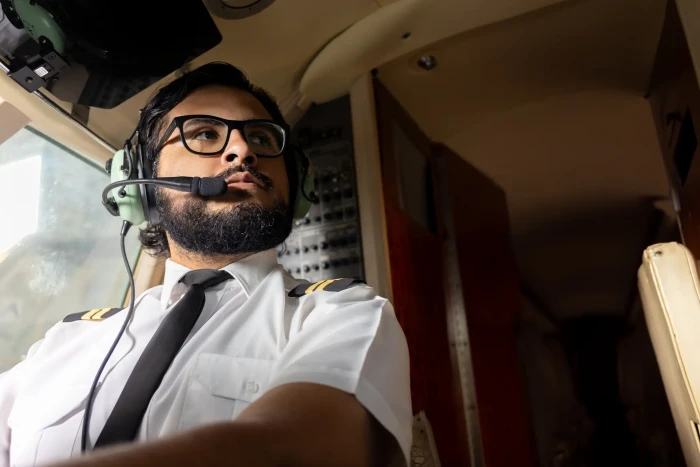 Airline pilot grooming standards, clean-shaven face required for safety protocols