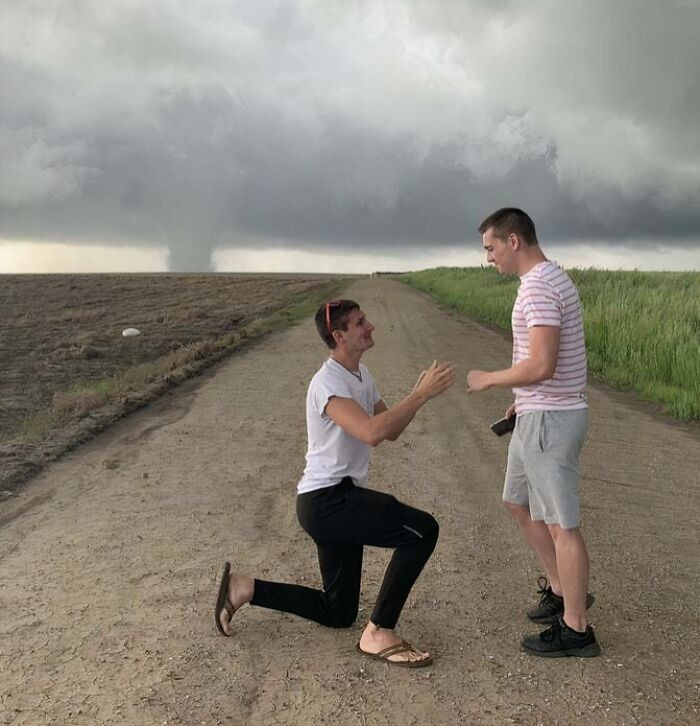 "Storm Chaser Proposed With Kansas Tornado In The Background"
